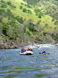 Paddle boat on the Tuolumne in spring